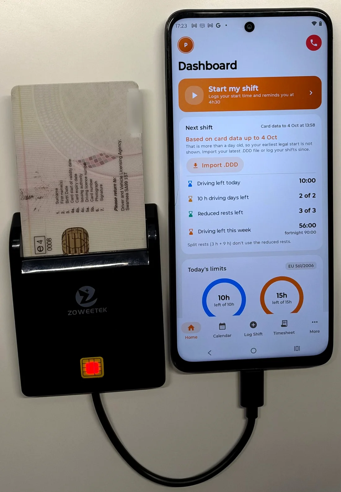 Zoweetek reader with a tachograph driver card, plugged into an Android phone running HGV Driver Companion